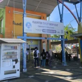 Travelers queue at Lumut Jetty ticket counter for ferry to Pangkor Island – Kuala Lumpur to Pangkor Island transfer