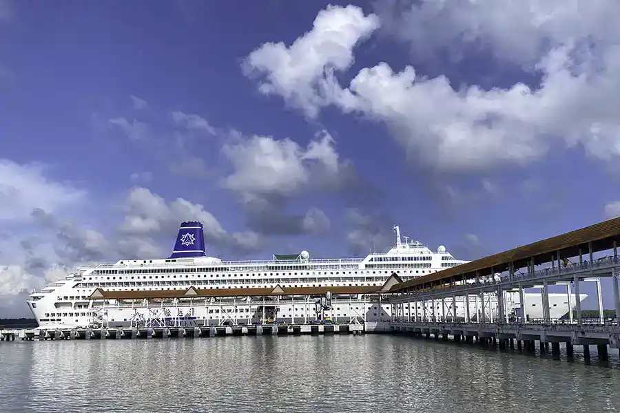 Cruise ship docked at Port Klang cruise terminal in Malaysia — the starting point for cruise passengers visiting Batu Caves on a shore excursion