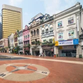 Colorful colonial buildings at Kuala Lumpur’s Old Market Square, a heritage site included in the Batu Caves and Kuala Lumpur city tour