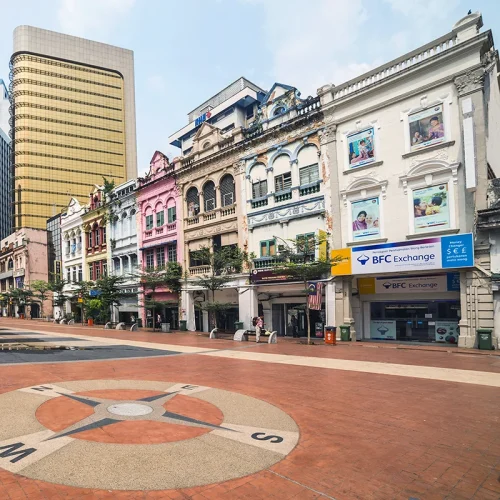 Old Market Square – Heritage Stop on Batu Caves and Kuala Lumpur City Tour Colorful colonial buildings at Kuala Lumpur’s Old Market Square, a heritage site included in the Batu Caves and Kuala Lumpur city tour