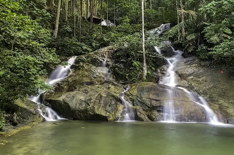 Kanching Waterfalls in lush rainforest setting, a popular nature attraction near Kuala Lumpur for a refreshing short trip.
