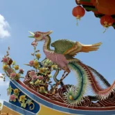 Colorful phoenix sculpture on the roof of Thean Hou Temple in Kuala Lumpur, part of the Batu Caves and Kuala Lumpur City Highlights Tour
