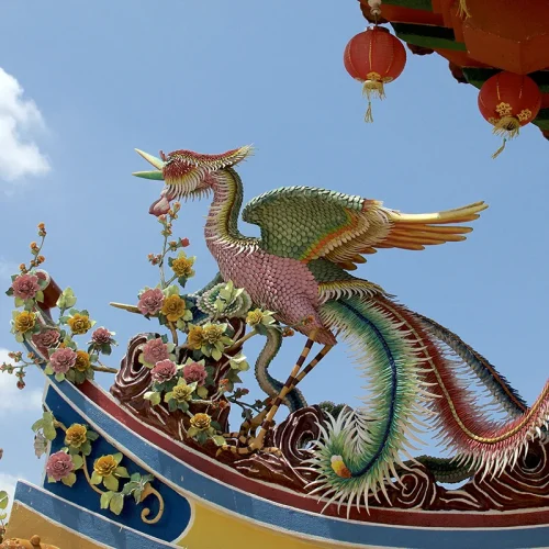 Thean Hou Temple – Chinese Cultural Landmark in Kuala Lumpur City Tour Colorful phoenix sculpture on the roof of Thean Hou Temple in Kuala Lumpur, part of the Batu Caves and Kuala Lumpur City Highlights Tour