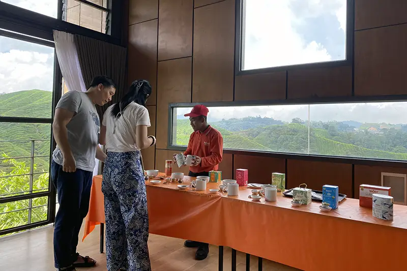 Tourists enjoying a tea tasting session at BOH Tea Centre Sungei Palas in Cameron Highlands