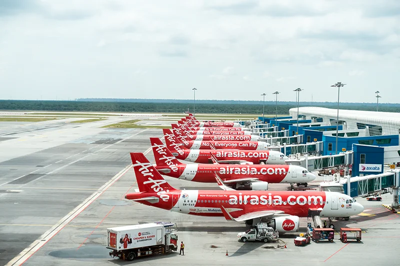 Airasia planes lined up at KLIA2 terminal in Kuala Lumpur International Airport