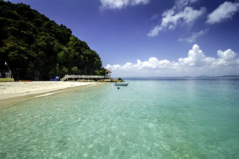 Kapas Island Malaysia beach with clear turquoise water and white sand