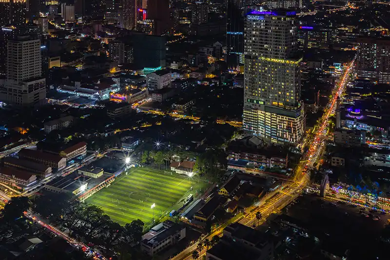 Aerial night view of Kampung Baru and Temu Hotel — one of the best areas to stay in Kuala Lumpur for local culture and food.