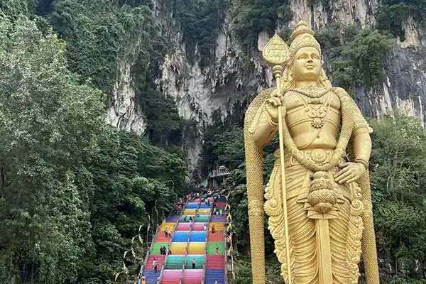 Batu Caves with the Lord Murugan statue and rainbow staircase, a major destinations in Malaysia