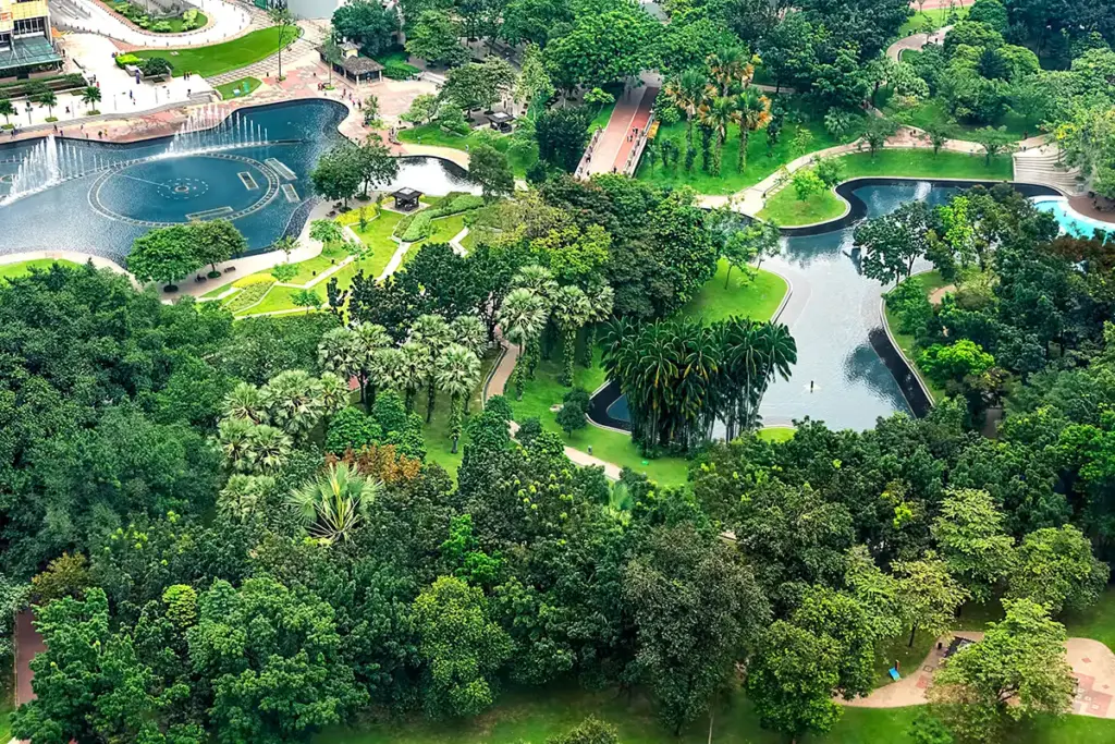 Aerial view of KLCC Park showing lakes, walking paths, and greenery in Kuala Lumpur
