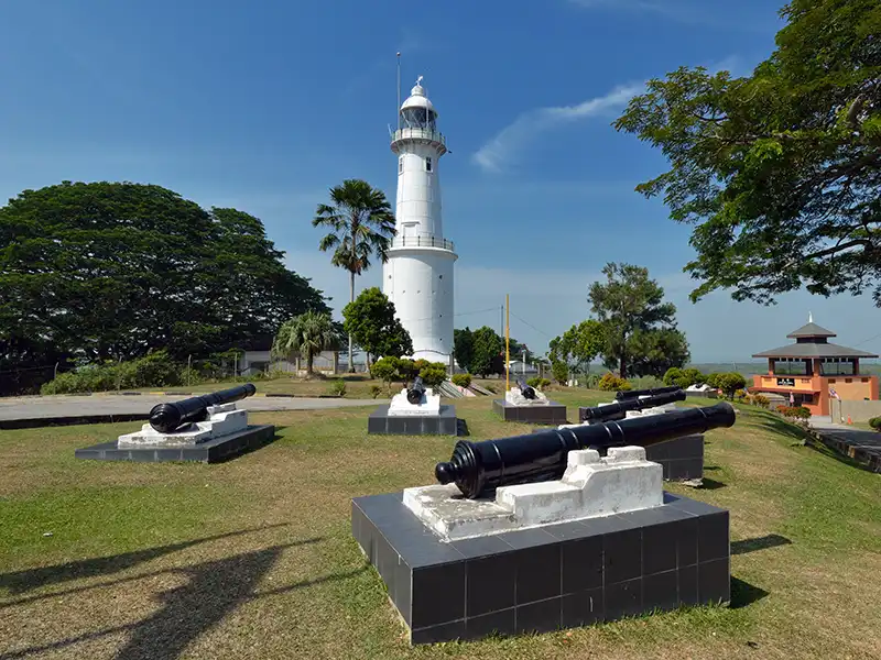 Bukit Melawati lighthouse and historic cannons overlooking Kuala Selangor