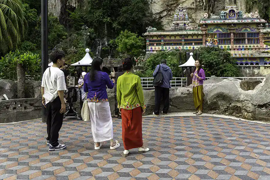 Content creators filming at Batu Caves temple complex in Kuala Lumpur