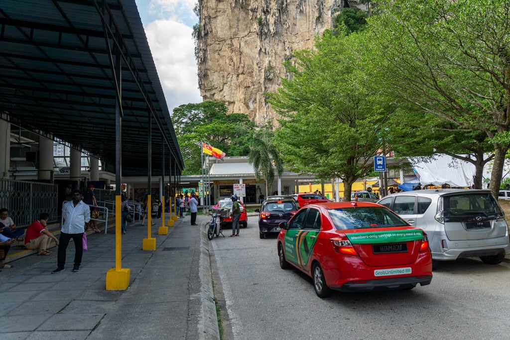e-hailing cars picking up passengers outside Batu Caves KTM Komuter station