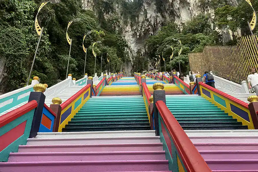 Freshly repainted Batu Caves rainbow staircase leading to the cave temple