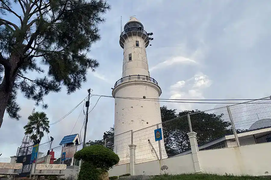 Bukit Malawati lighthouse overlooking Kuala Selangor before sunset in Selangor, Malaysia