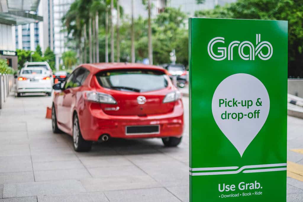 Grab pickup and drop-off point in Malaysia showing ride-hailing service used for getting around cities like Kuala Lumpur