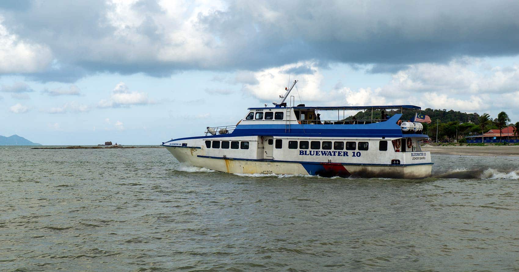 Bluewater Express ferry departing Mersing Jetty on the crossing to Tioman Island from Kuala Lumpur