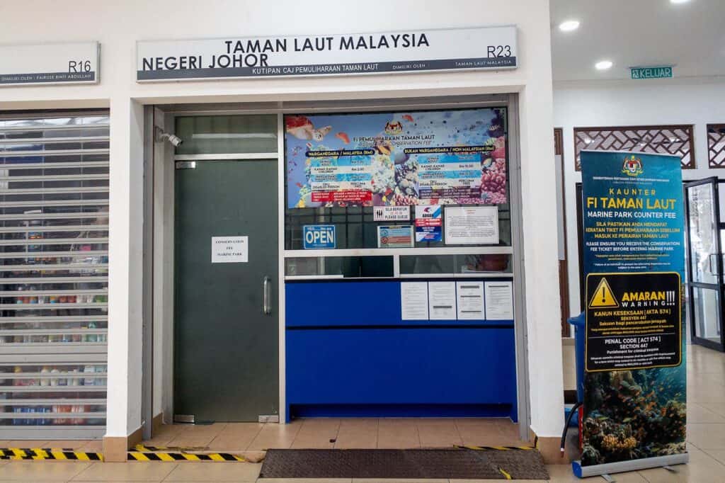 Taman Laut Malaysia Marine Park Conservation Fee counter R23 at Mersing Harbour Centre — obtain Marine Park permit before boarding ferry to Tioman Island