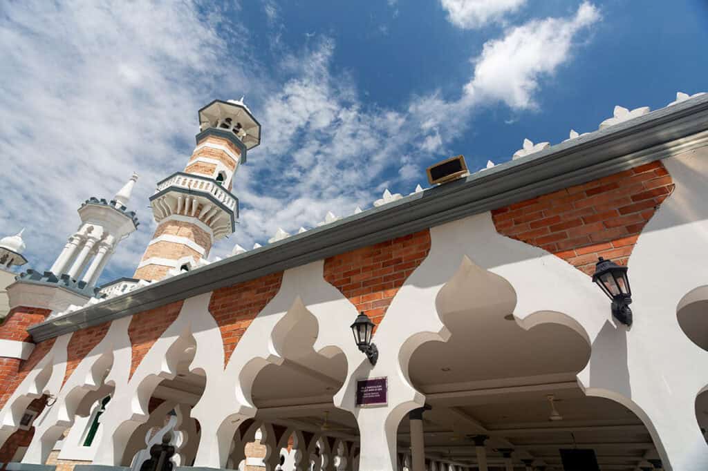 Moorish arches and minaret of Masjid Jamek — one of the oldest mosques in Kuala Lumpur, built at the confluence of the Klang and Gombak rivers