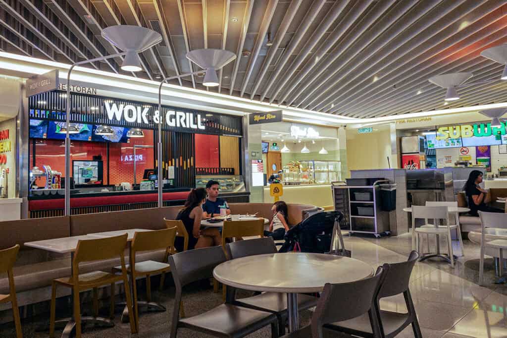 Indoor food court at Suria KLCC mall with multiple dining options — a convenient dinner stop after an evening at KLCC Park in Kuala Lumpur