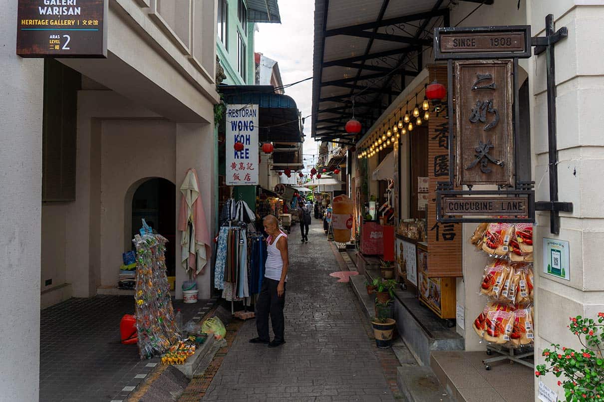 Concubine Lane narrow alley in Ipoh Old Town Malaysia with heritage shophouses and local vendors