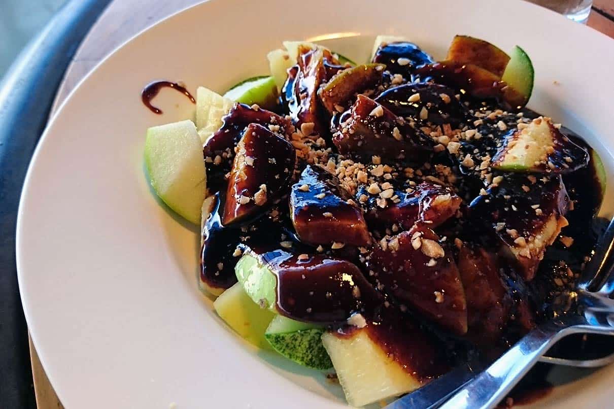 Ipoh rojak fruit salad with thick prawn paste sauce and crushed peanuts in Ipoh Malaysia