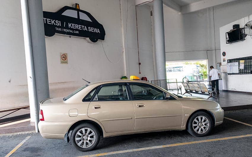 Taxi and kereta sewa stand at Jerantut bus terminal — onward transport from Kuala Lumpur to Taman Negara