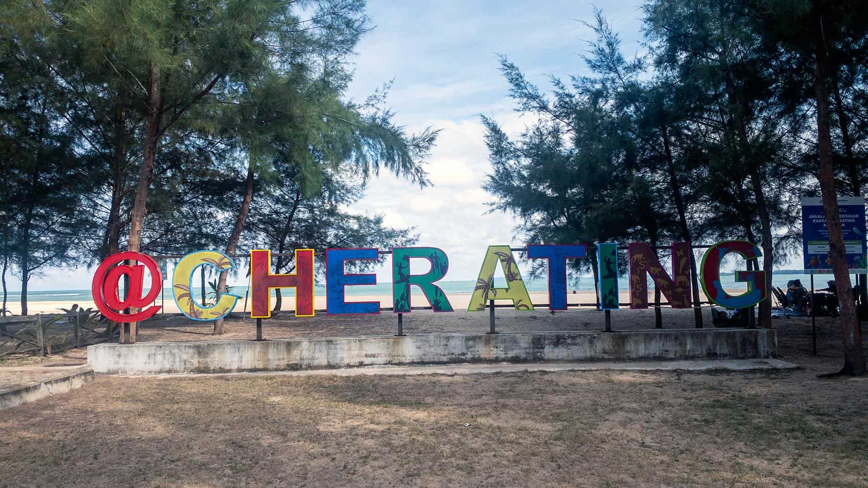 Colourful @Cherating beach sign facing the South China Sea — getting from Kuala Lumpur to Cherating by private transfer