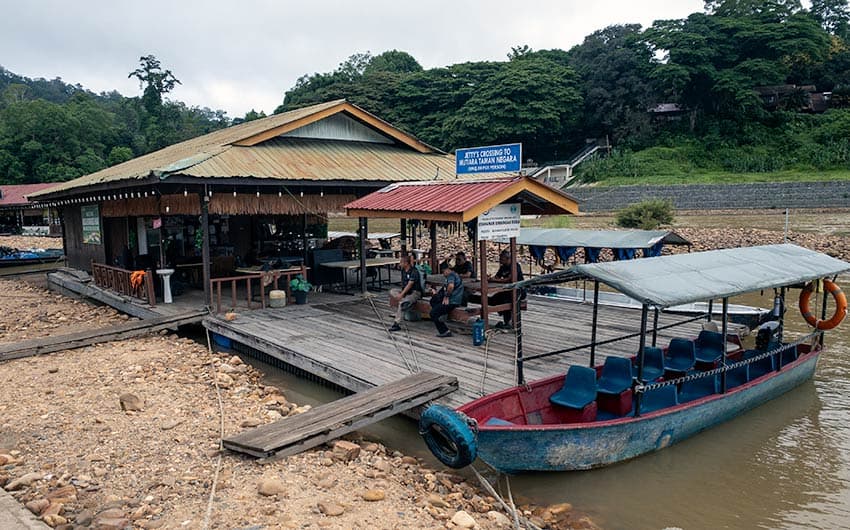 Kuala Tahan jetty with river boat for crossing to Mutiara Taman Negara Resort on the journey from Kuala Lumpur to Taman Negara National Park