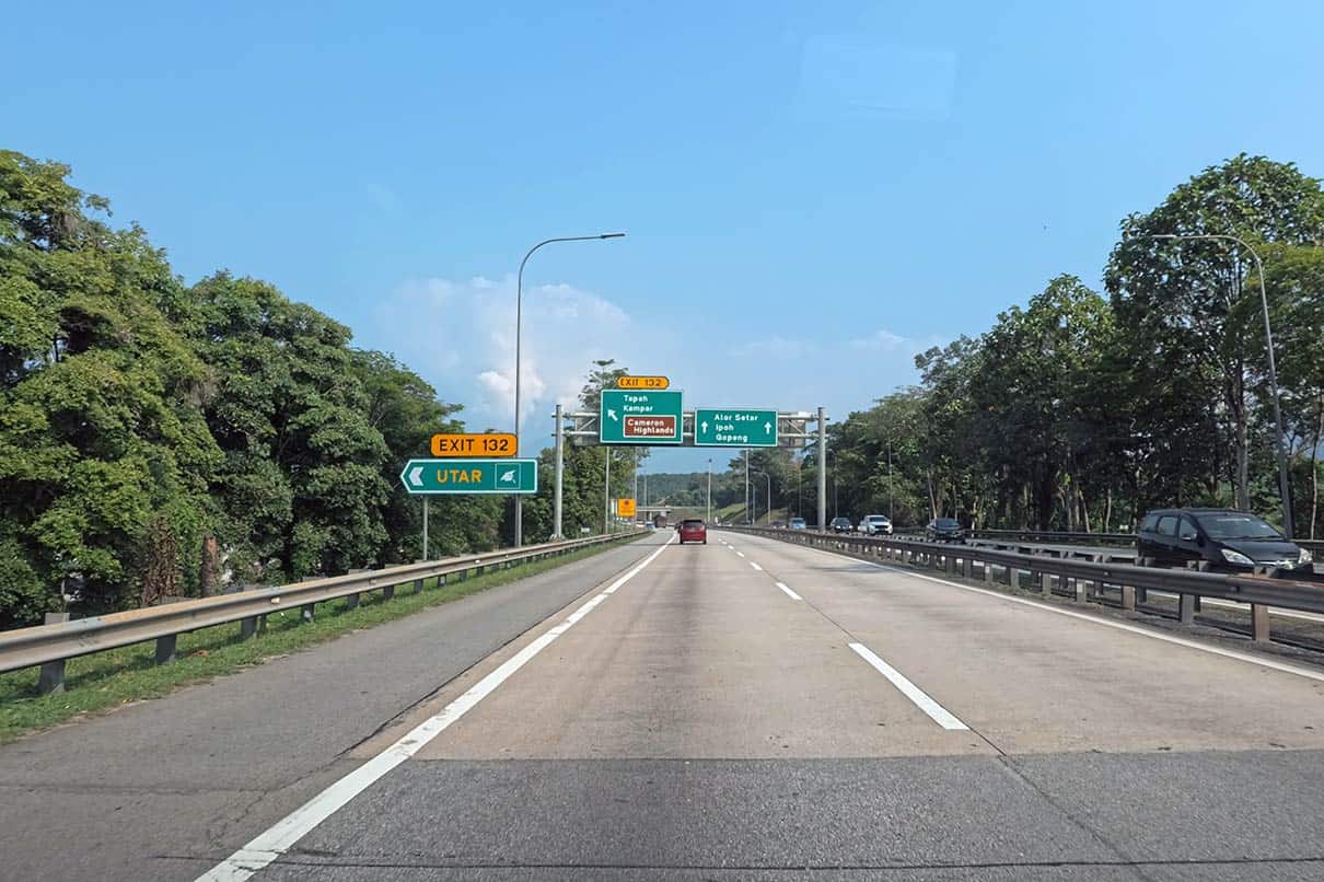 North South Expressway highway sign showing Cameron Highlands and Ipoh Malaysia exit