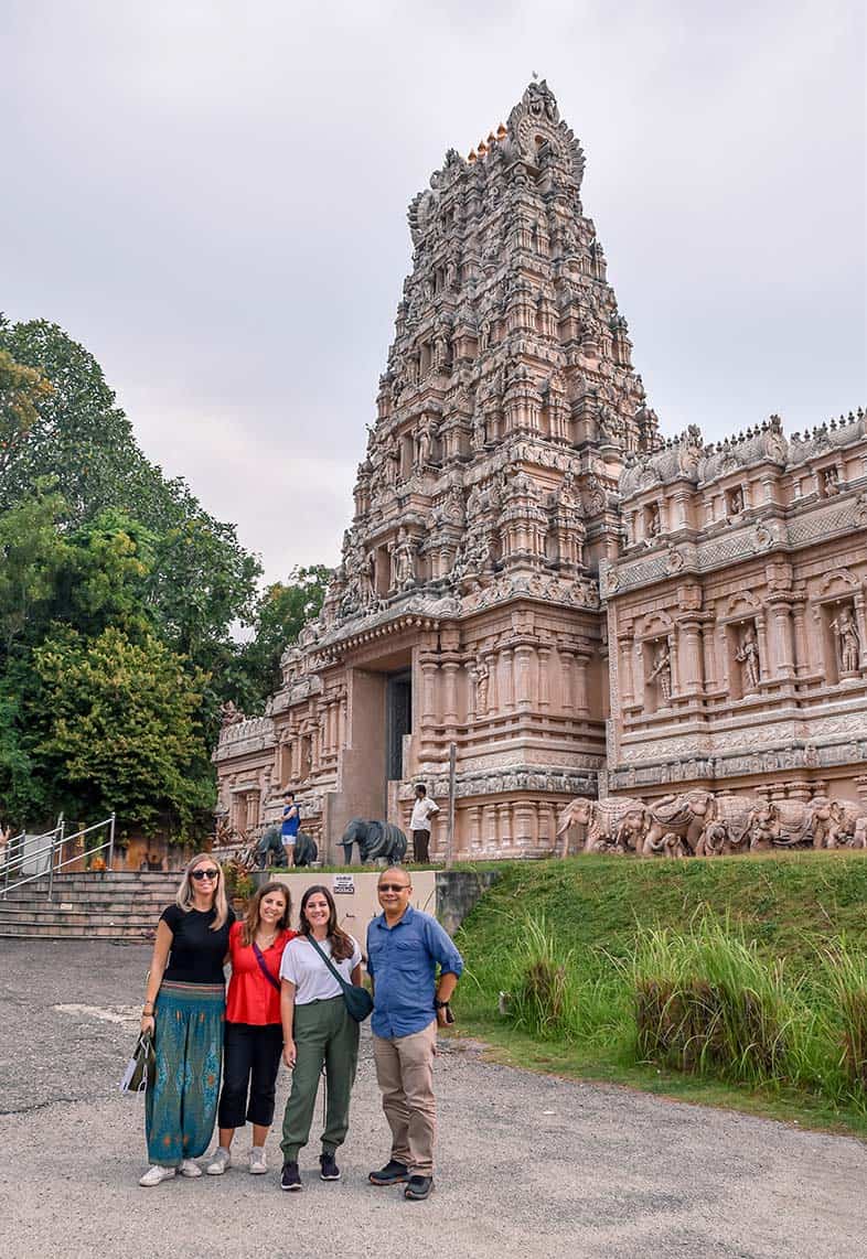 Anuar, founder of We Go With Anuar, with guests in front of Sri Shakti Temple in Kuala Selangor during a private fireflies day tour