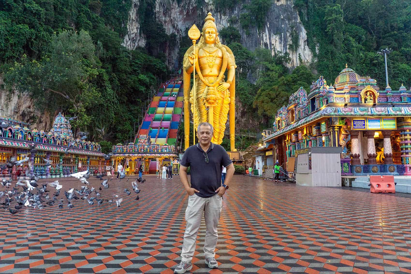 Anuar, founder of We Go With Anuar, on site at Batu Caves during research for this article